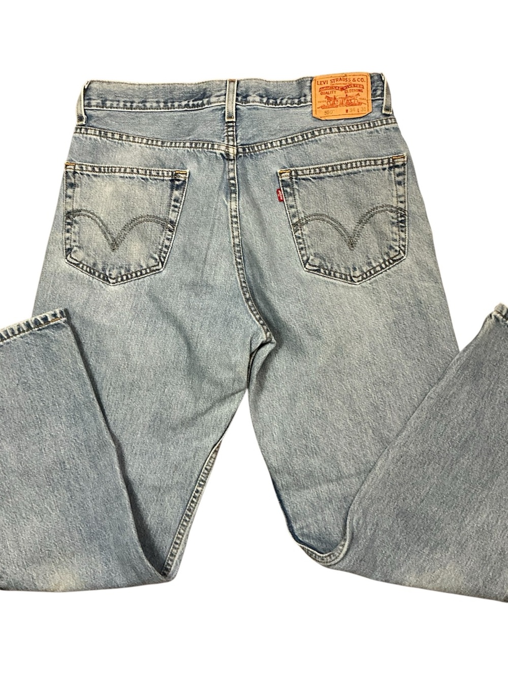 Vintage Levi’s 550 relaxed fit medium/light wash straight leg jeans 33 x 30